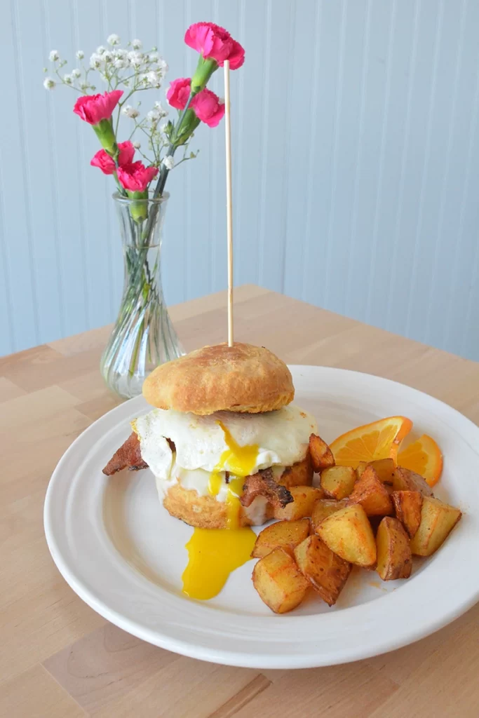Breakfast Biscuit with Side of Potatos at Tchotchke St. Pete